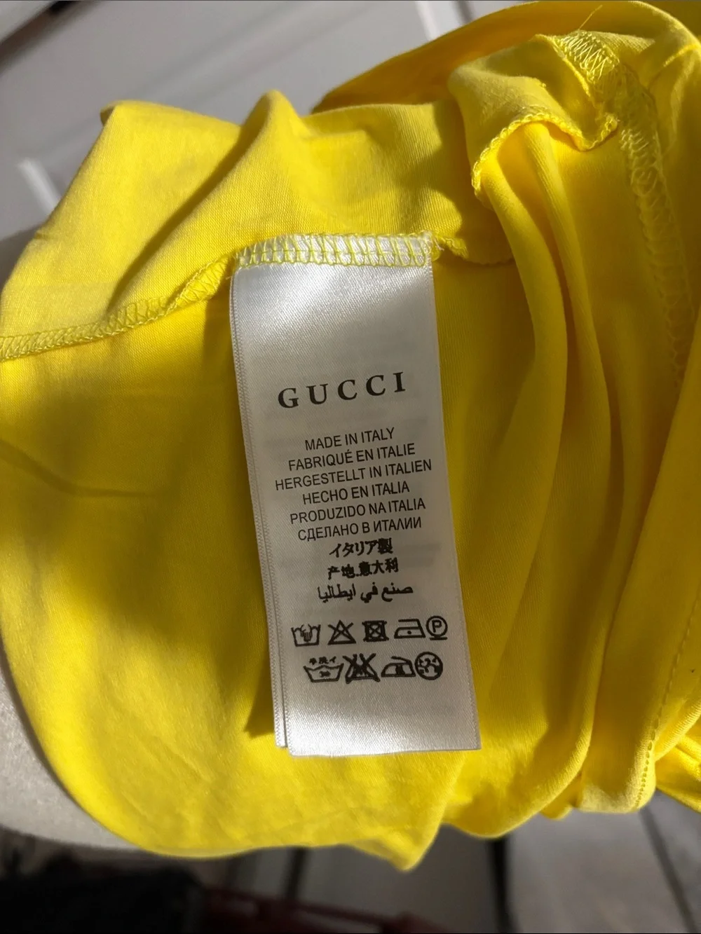 Gucci Yellow V-Neck Tee with Multicolor Superhero Graphic
